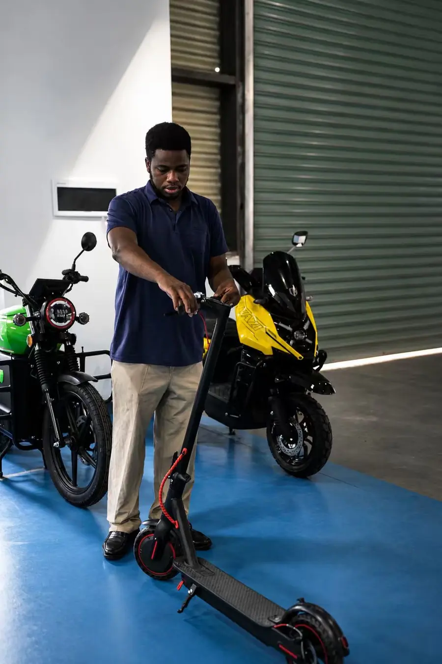 Customer testing an electric scooter in the Jiangxi Shanxing showroom